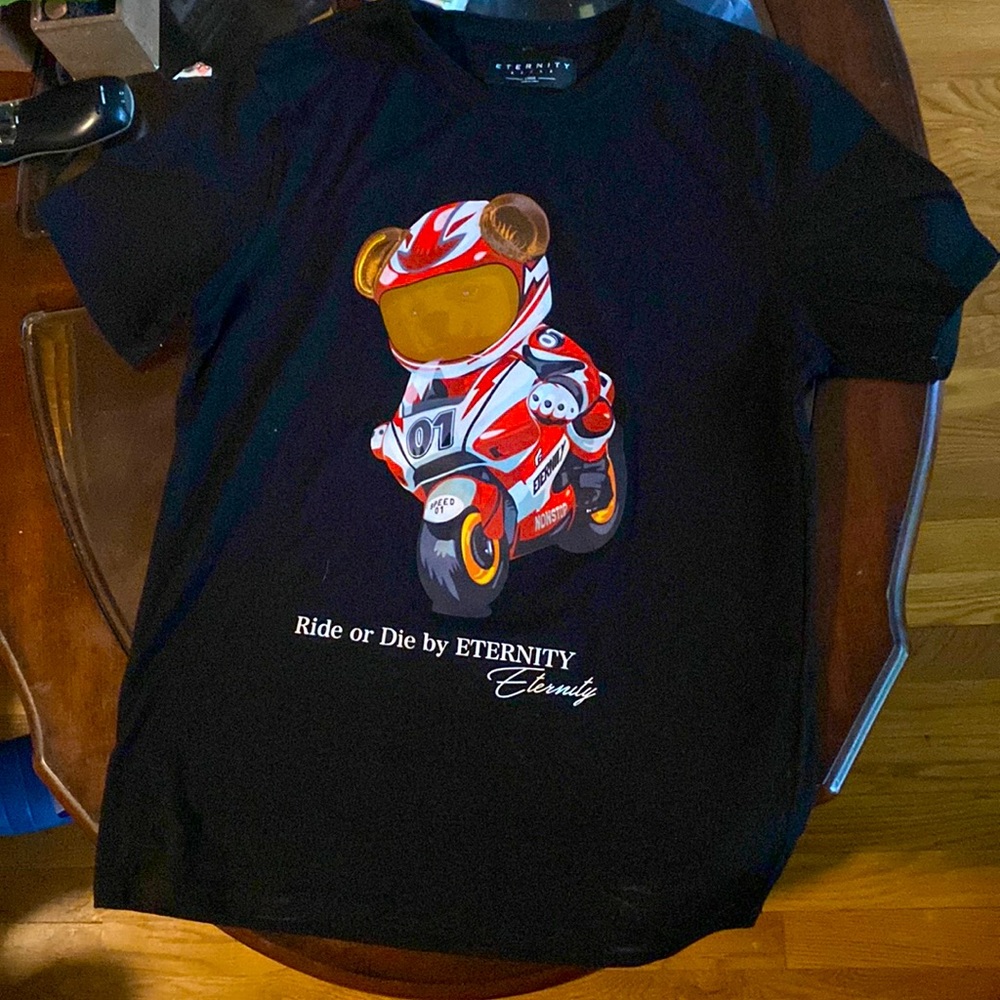 ETERNITY BLACK T SHIRTS WITH DESIGNS OF A SPACE SUIT BEAR ON A MOTORCYCLE